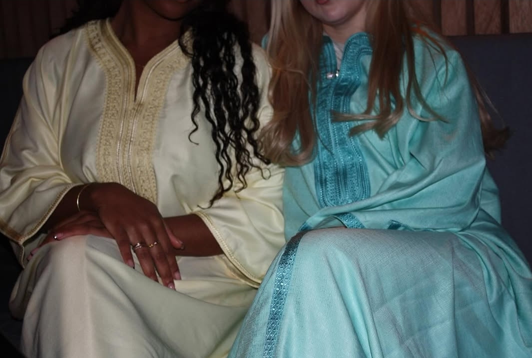 Two friends wearing Zina Zina gandouras